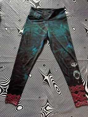 Onzie Black Leggings with Teal Tie-Dye and Pink Geometric Cuffs